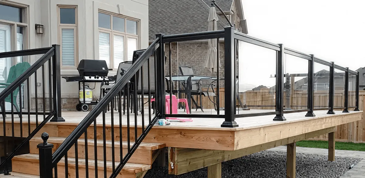 Handrail installation on a deck staircase for safety and code compliance in Newark, NJ